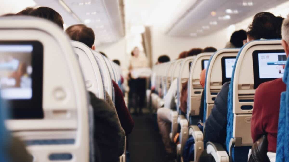 shallow focus photography of people inside of passenger plane