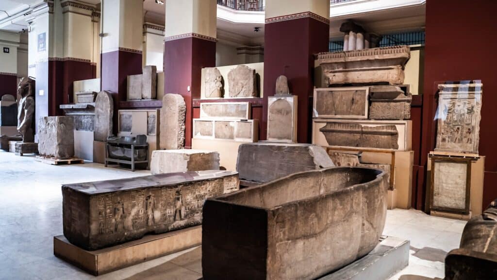 Grand Egyptian Museum | a room filled with lots of different types of furniture