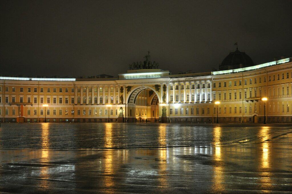 State Hermitage Museum Russia | a large building with a clock on the front of it