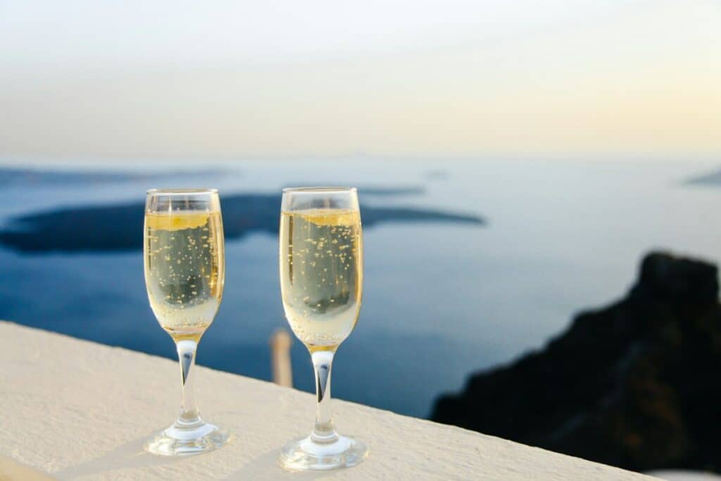 Second honeymoon destination ideas | wine glasses shallow focus