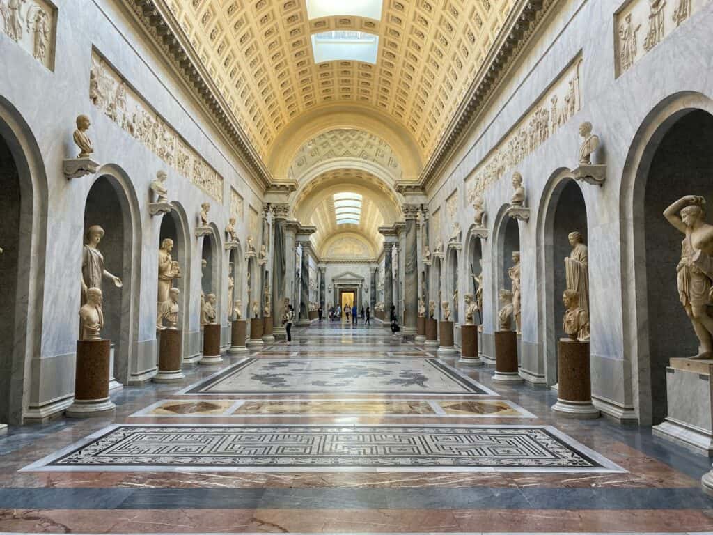 The Vatican Museums | brown and beige concrete building interior