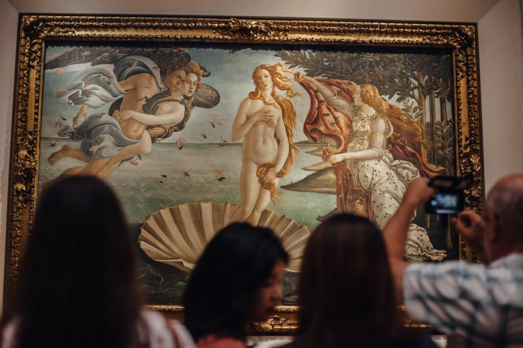 Uffizi Gallery | people in front of gold framed painting